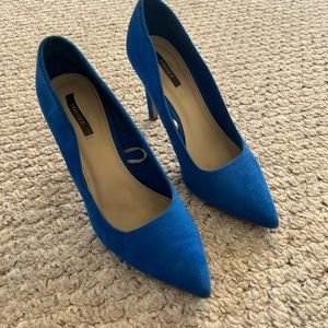 Blue suede pumps